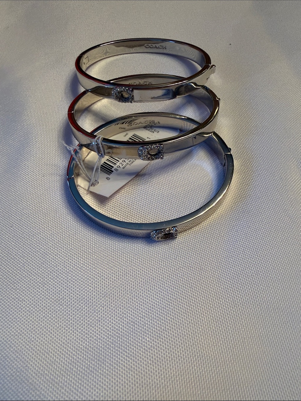 COACH Silver-Tone Crystal Accent Hinged Bangle Bracelet each $60